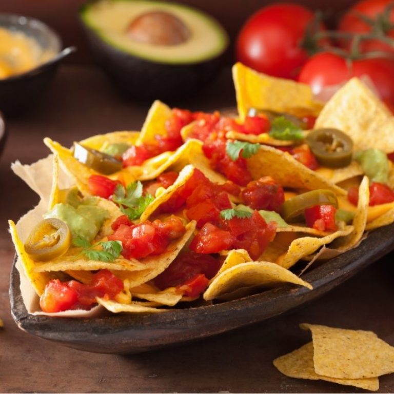 demo-attachment-1166-nachos-loaded-with-salsa-guacamole-cheese-and-P7GUFN7